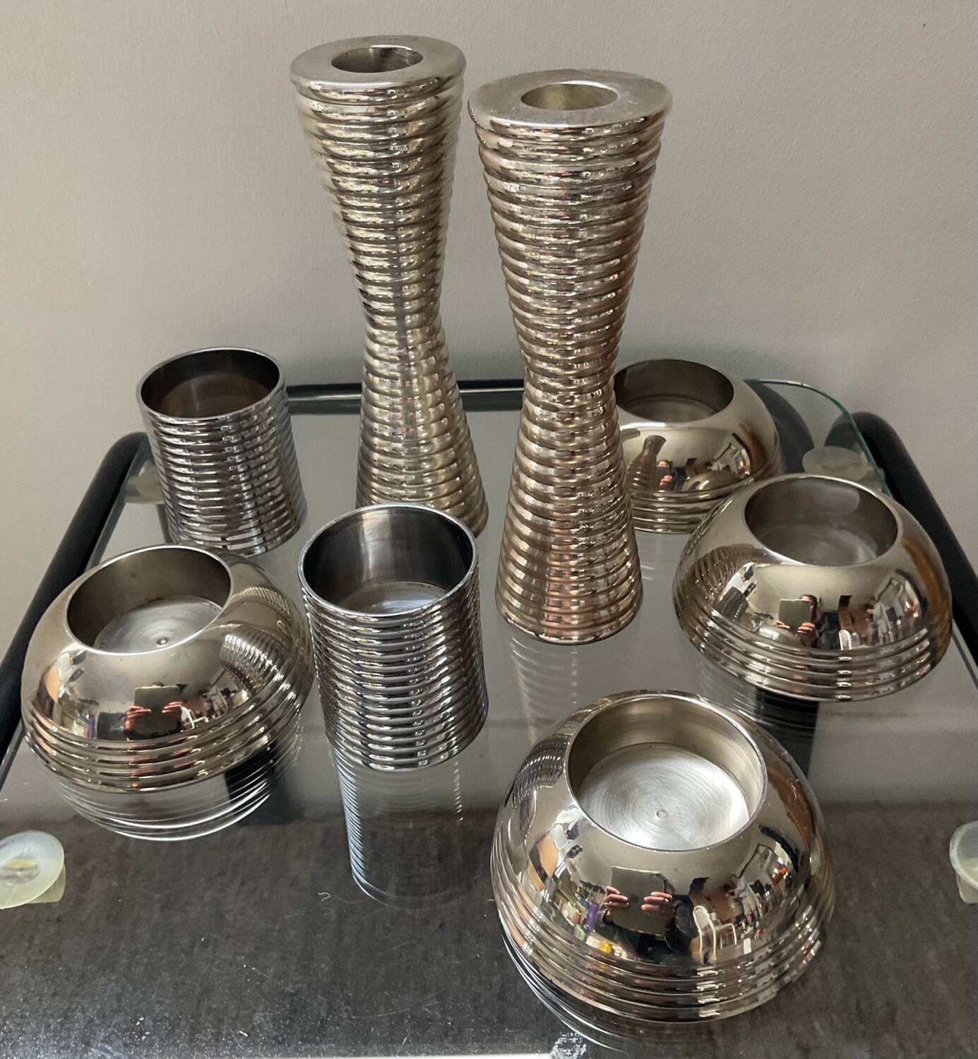 Series of 8 vintage candlesticks in silver metal