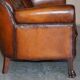 Victorian Chesterfield leather canapé with oak lion claw feet.