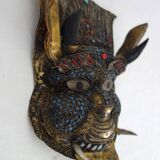 Vintage ritual mask in repoussé brass from Nepal/Tibet.