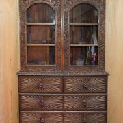 19th-century Anglo-Indian colonial hardwood library on a chest of drawers.