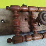 Old wooden wall coat rack