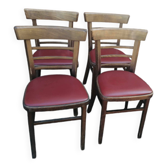 Set of 4 bistro chairs in curved wood and vintage red skai seats.