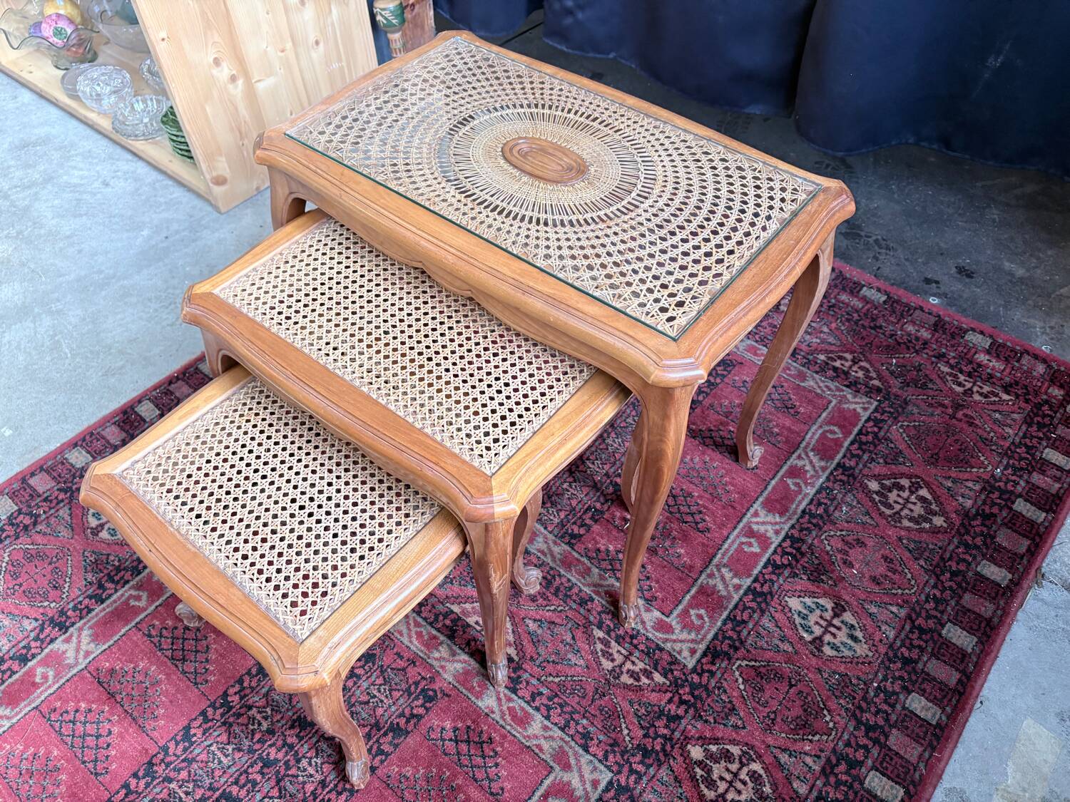 Vintage nesting tables in wood and cane – perfect condition.