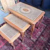Vintage nesting tables in wood and cane – perfect condition.