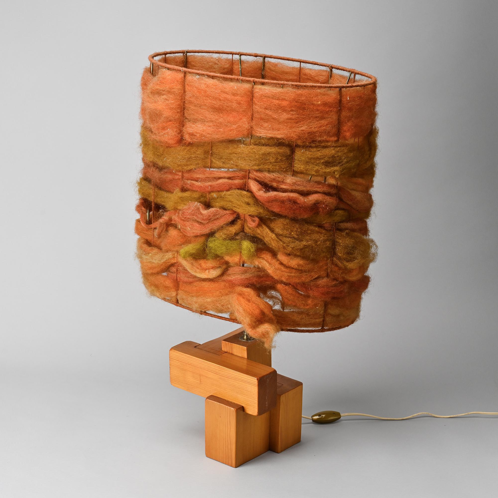 Sculptural table lamp in solid pine, France, circa 1970.