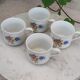 Coffee cup with floral design in porcelain