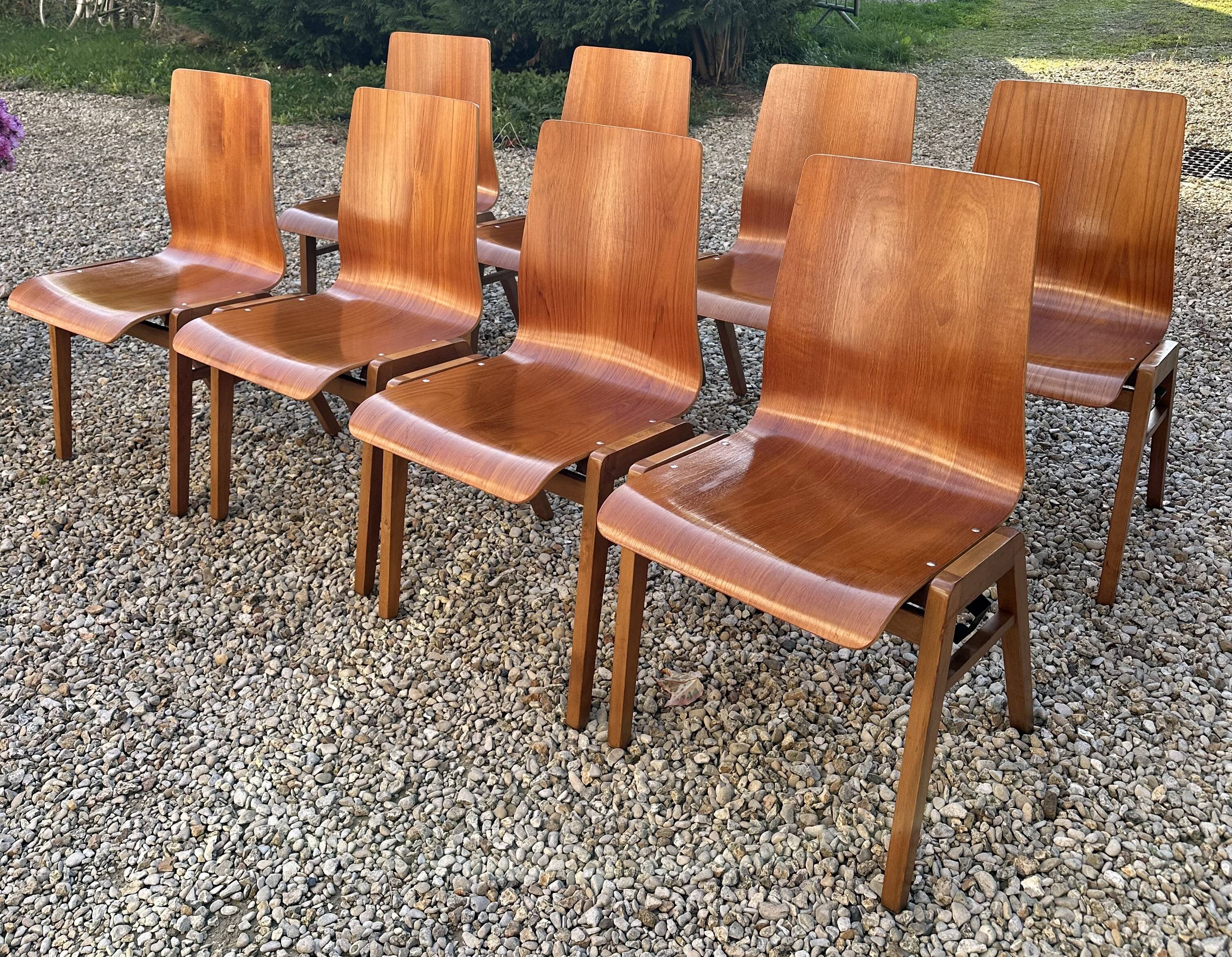 Scandinavian chairs (set of 8) in thermoformed beech from the 1960s.