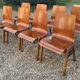 Scandinavian chairs (set of 8) in thermoformed beech from the 1960s.