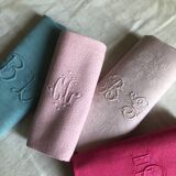 Suite of four antique tinted napkins