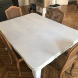 One table table and 8 oak chairs