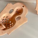 Pair of terracotta wall candle holders
