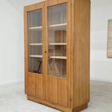Oak glass-fronted school cabinet 1960