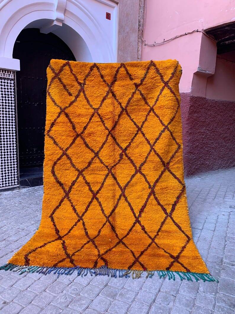 Beni oren art rug, handmade moroccan rug, yellow black red rug, abstract yellow rug.