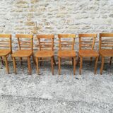 12 varnished bistro chairs