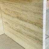 Vintage side table in travertine, circa 1980s.