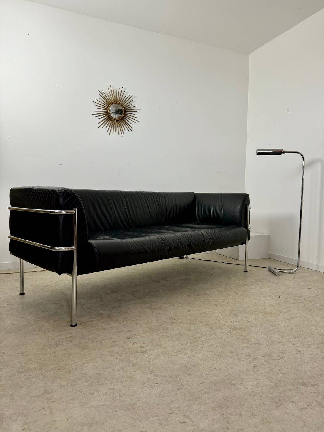 Old 3-seater sofa in tubular and black leather by Kébé, Denmark 1970s