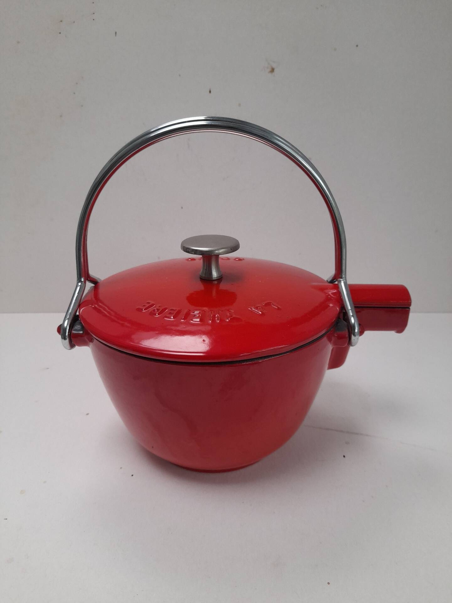 The Staub red enamelled cast iron teapot.