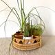 Porte bouteilles vintage , porte plantes en rotin tressé