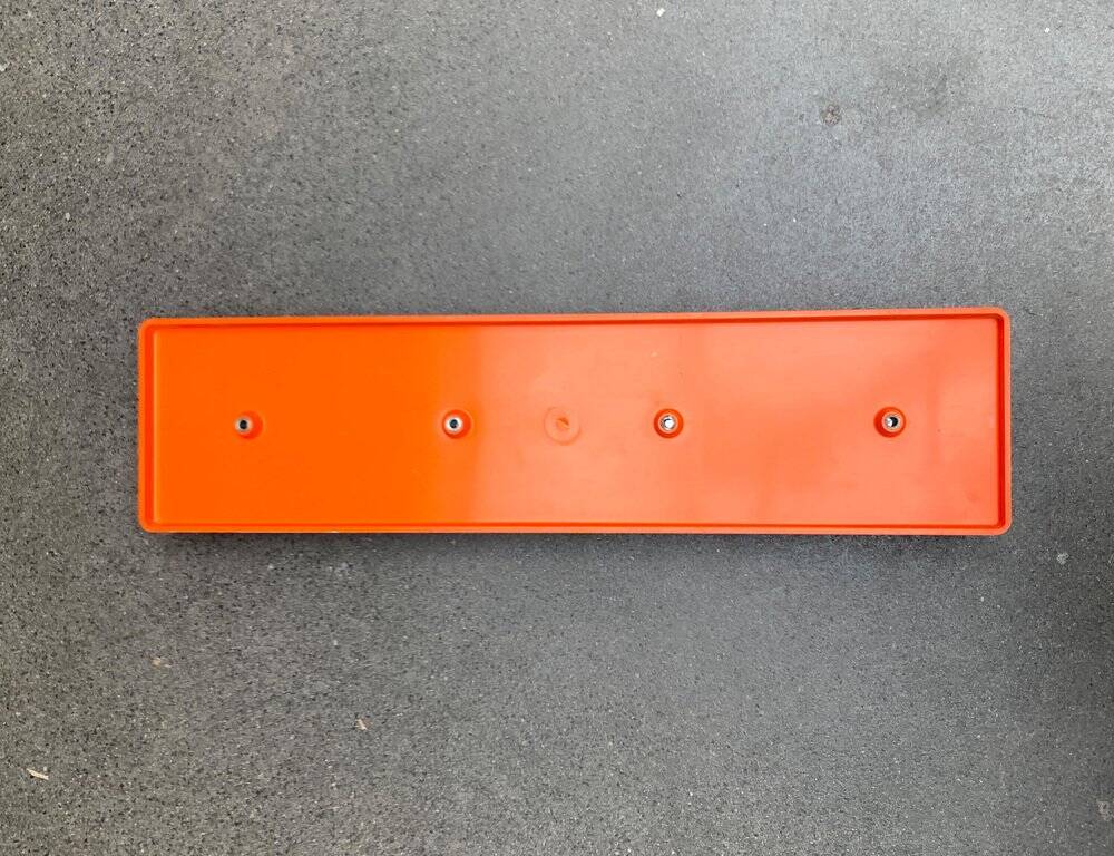 Orange coat rack from the mid-century space age, 1960s.