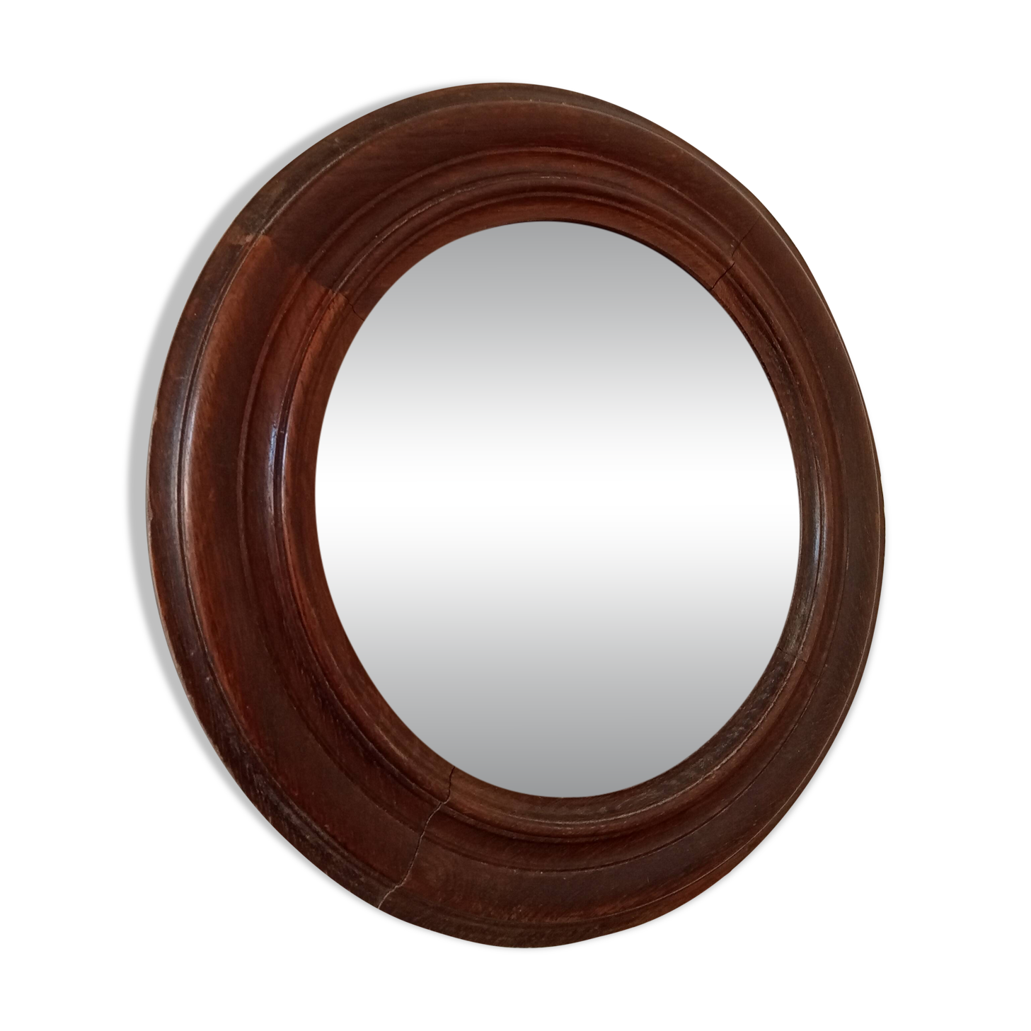Antique round wooden mirror