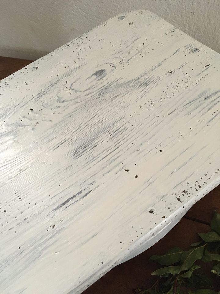 Former foot, skated in white wooden rest