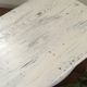 Former foot, skated in white wooden rest