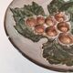 Vintage ceramic bowl – embossed grape pattern in slip style