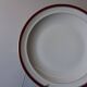 Round hollow serving plate in porcelain from Chastagner et Cie in good condition.