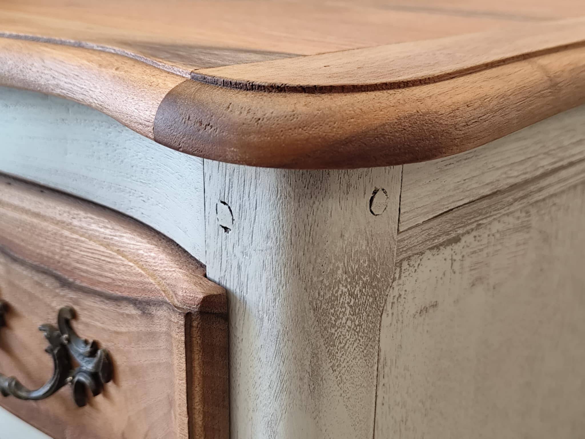 Walnut crossbow chest of drawers