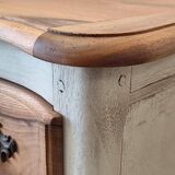 Walnut crossbow chest of drawers