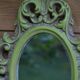 Small green wooden mirror