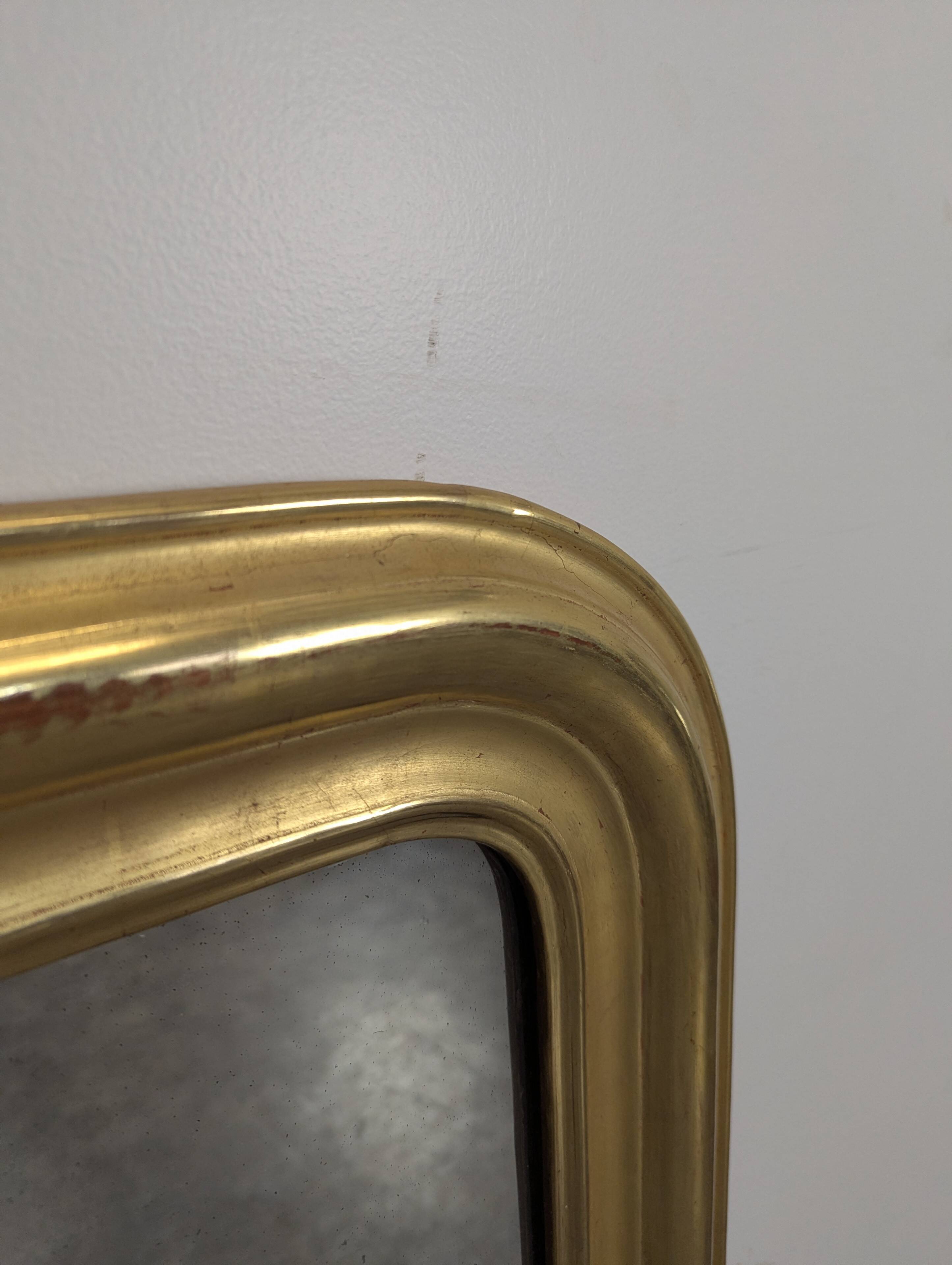 Golden mirror from the Louis Philippe period.