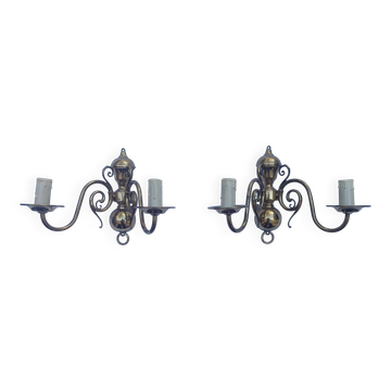 Pair of wall sconces in gilded brass