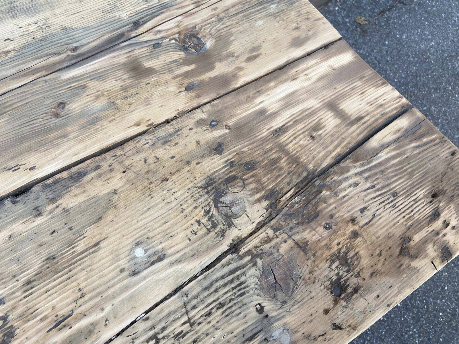 Primitive industrial table workbench in raw natural wood vintage bohemian trade store