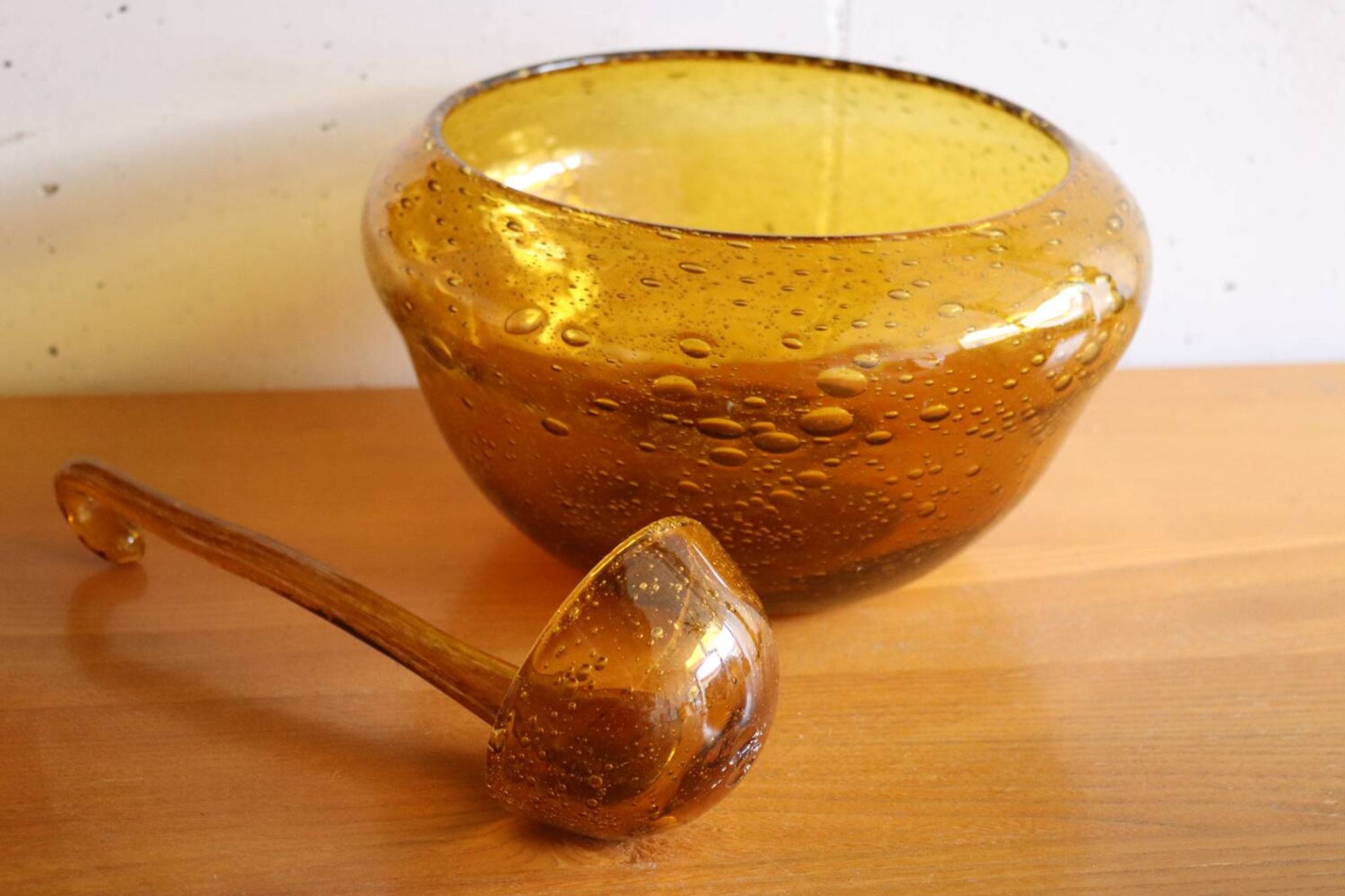 Vintage amber blown bubble glass salad bowl and ladle.