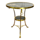 Gueridon tripod with gilded bronze frame covered with portor marble