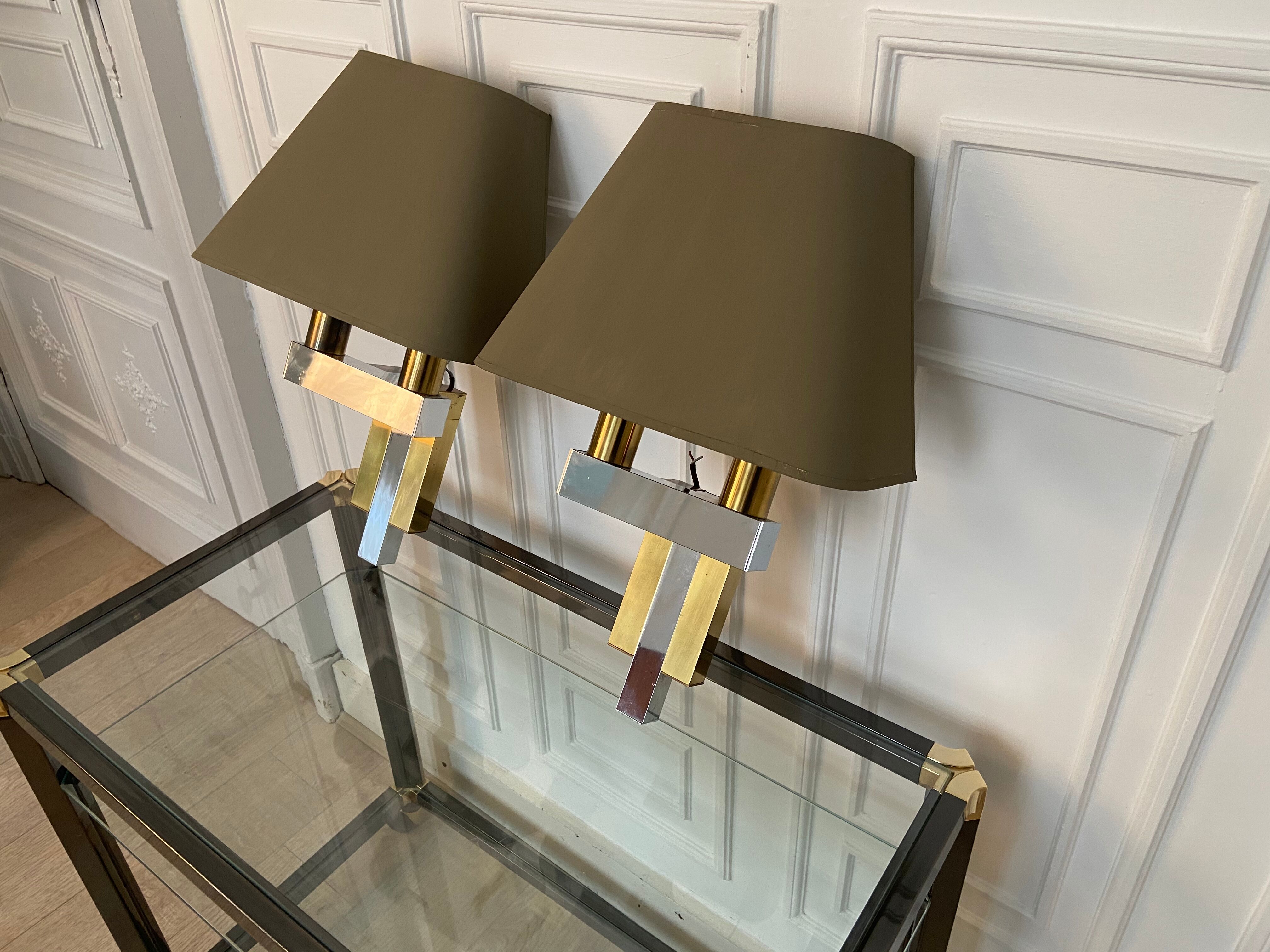 Pair of chrome and brass sconces, Italy, 1970s