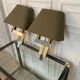 Pair of chrome and brass sconces, Italy, 1970s