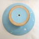Art Deco modernist coupe, with a base of 3 spheres, in turquoise ceramic and gilding.