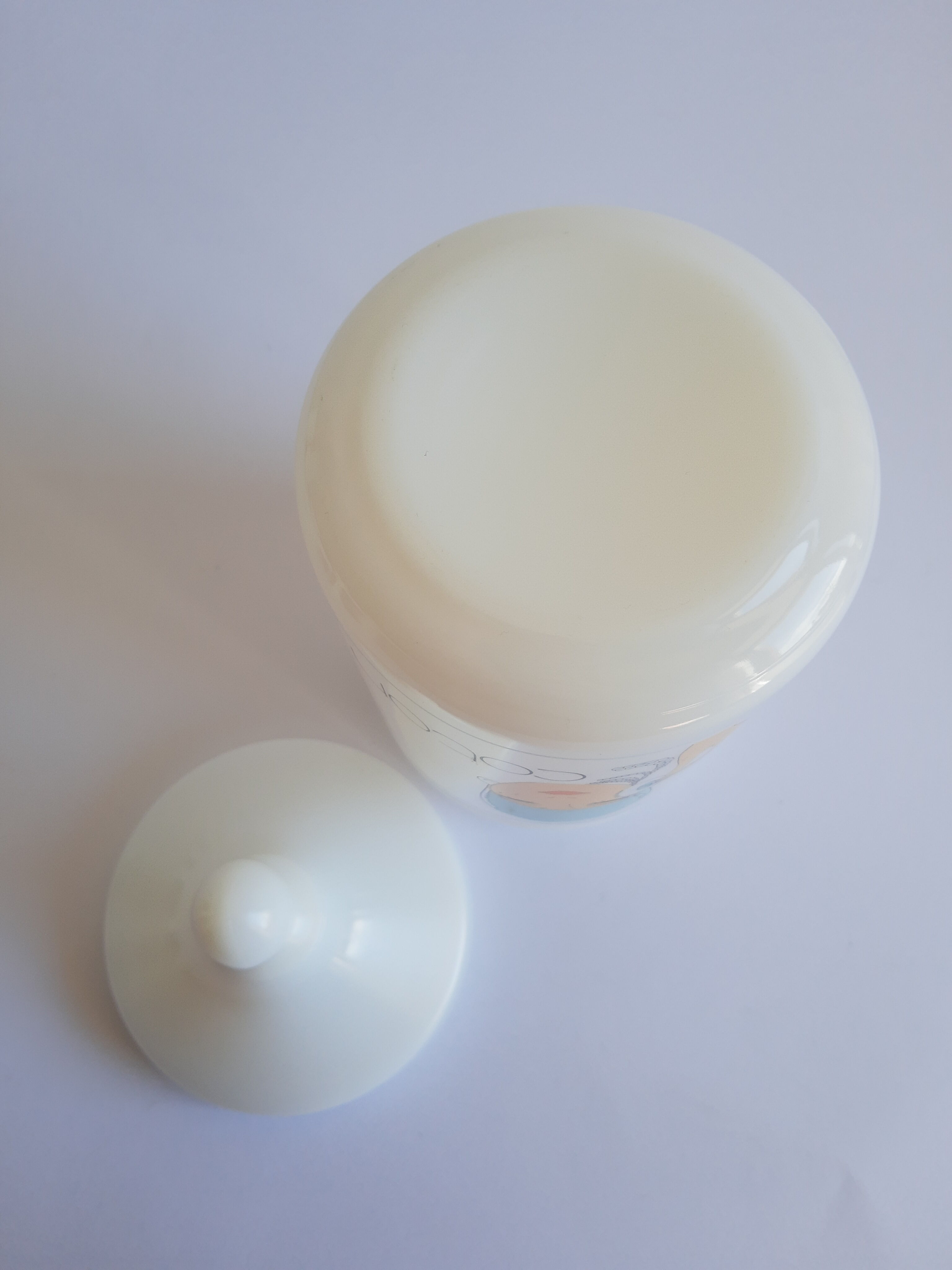 Old cotton bathroom pot in vintage opal year 1970