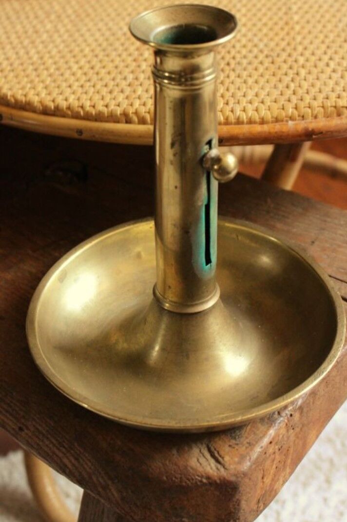 Brass pusher round cut candle holder