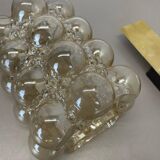 Amber vintage glass wall lamp by Helena Tynell for Glashütte Limburg, 1970s