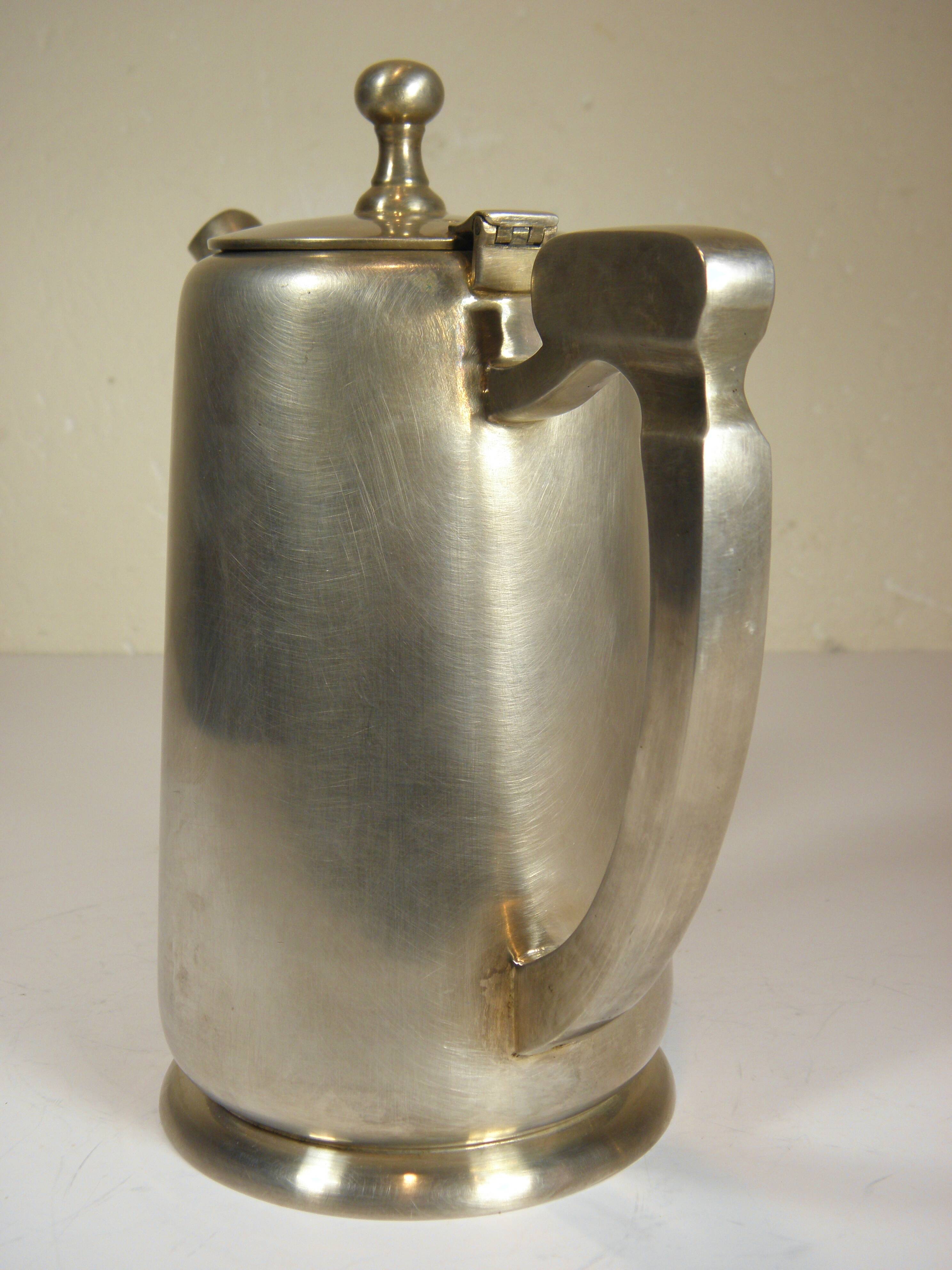 Silver-plated metal coffee pot and milk jug
