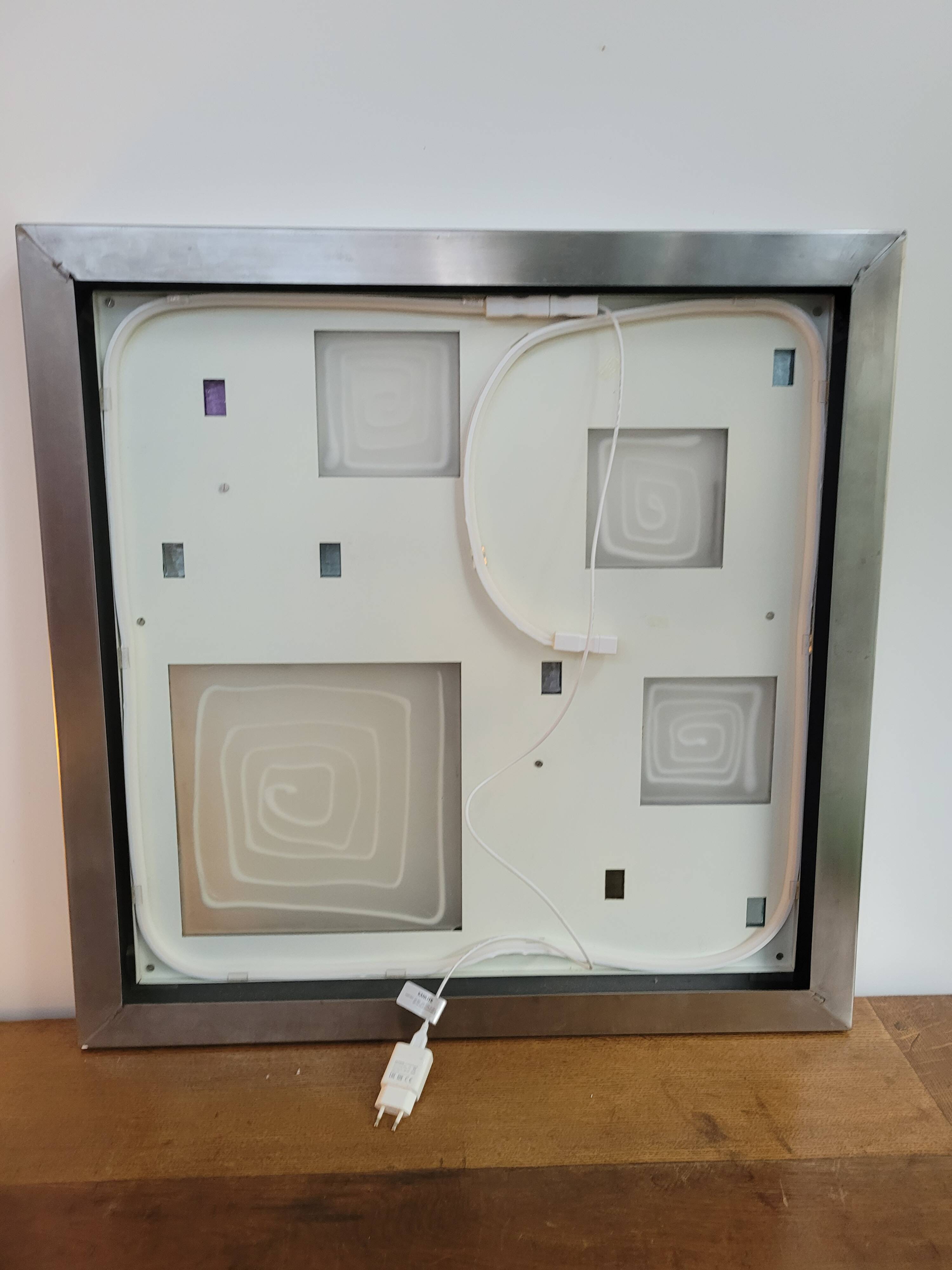 Wall light by Angelo Brotto, polished steel and Murano glass.