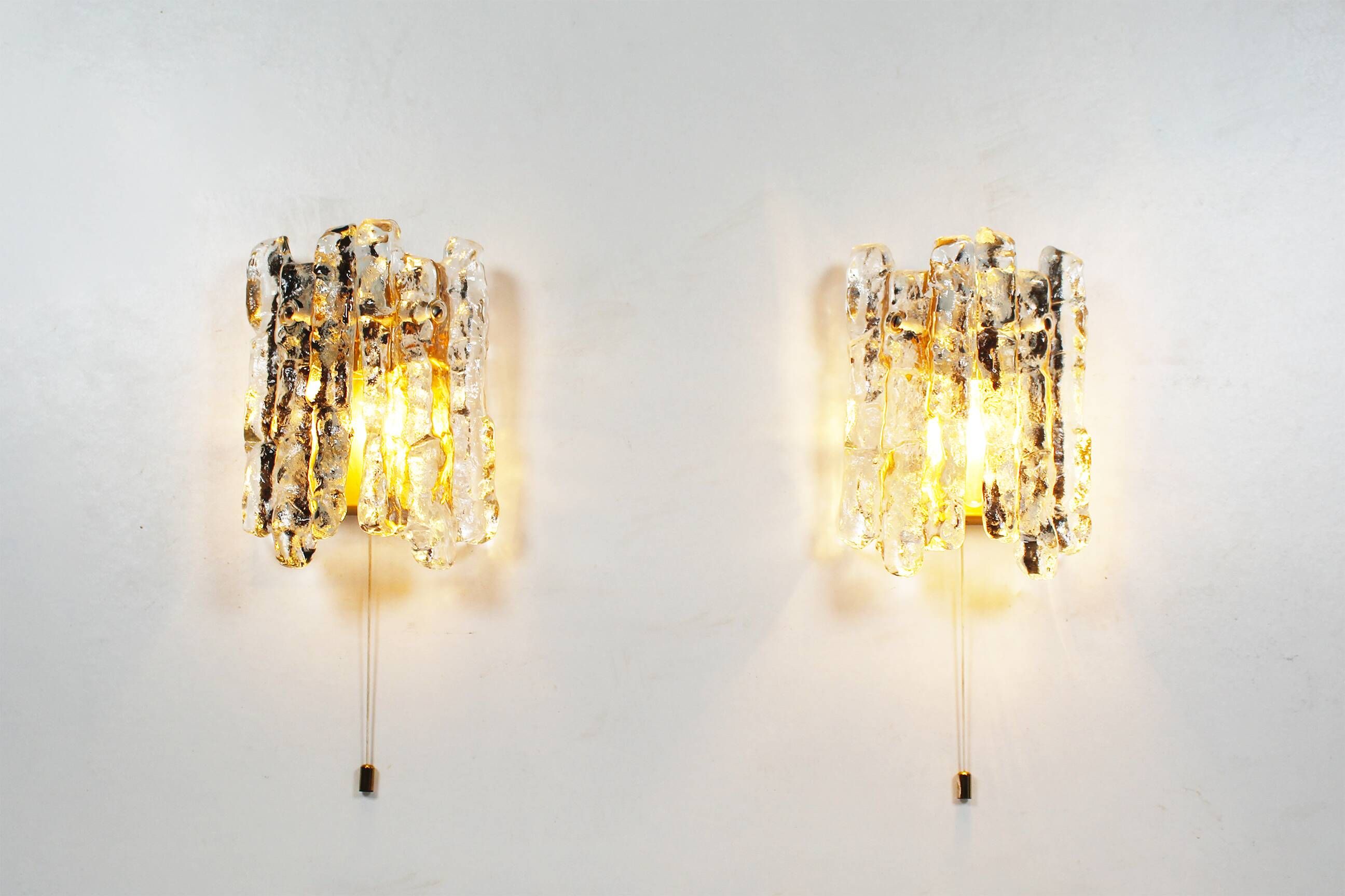 Set of two brass and heavy ice glass sconces by Kalmar, Austria 1970’s