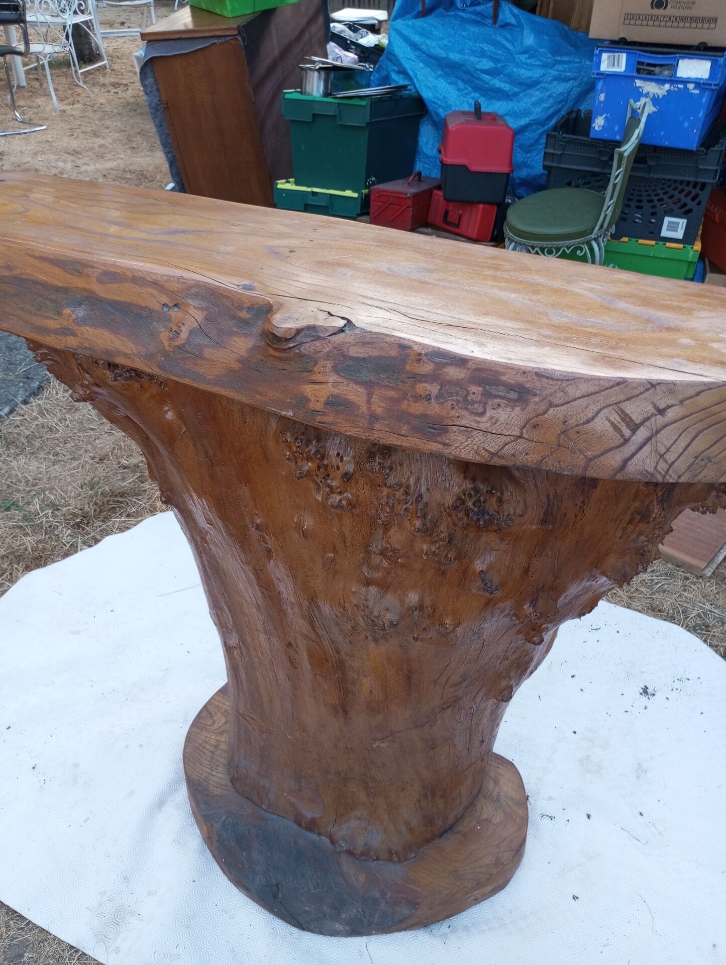 Vintage bar in brutalist style shaped like a tree trunk from the 1970s.