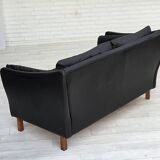 1970s, Danish 2-seater sofa, original black furniture leather, teak wood.