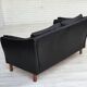 1970s, Danish 2-seater sofa, original black furniture leather, teak wood.
