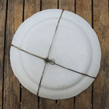 Old earthenware plate with wall support: floral decor