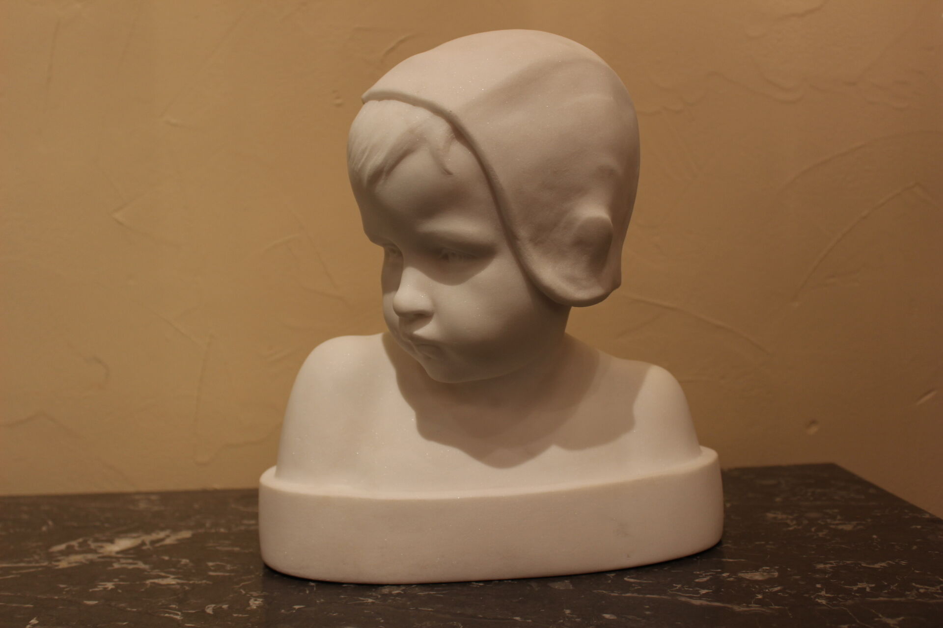 Marble bust of child